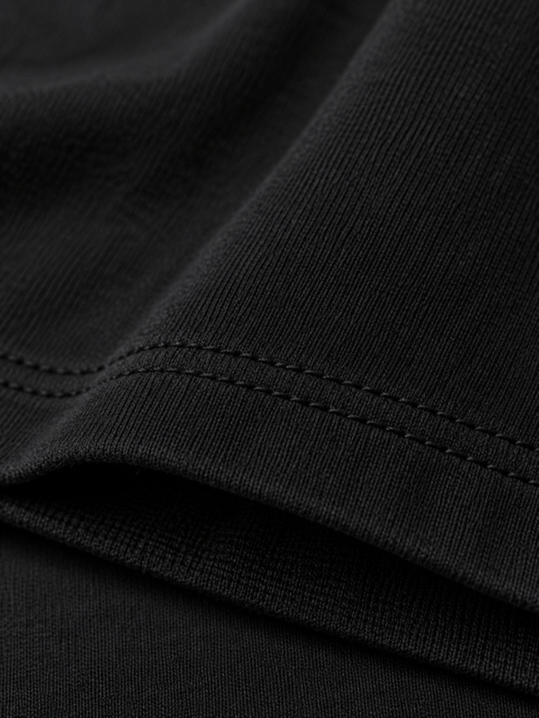 Black boxy t-shirt hem detail